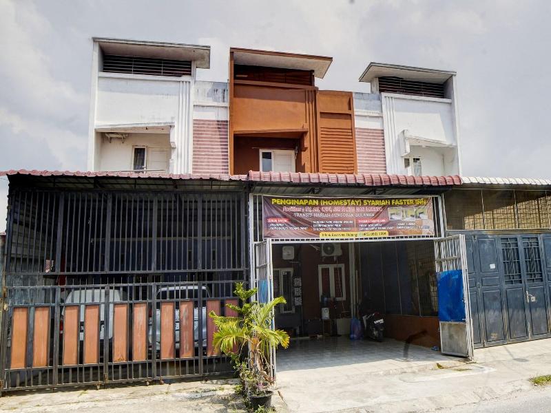 Hotel O Penginapan Syariah Faster Inn image