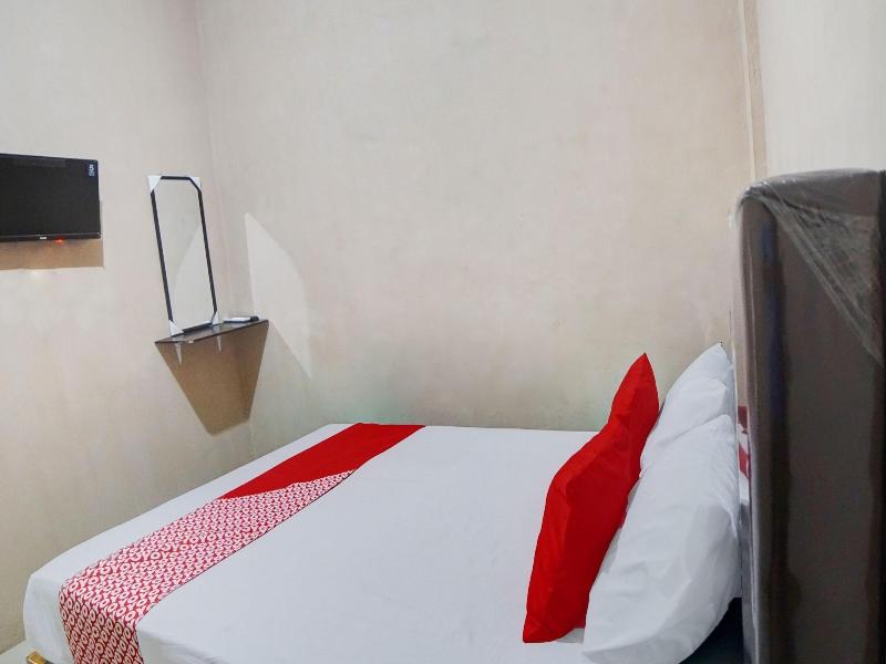 Hotel O Penginapan Syariah Faster Inn image