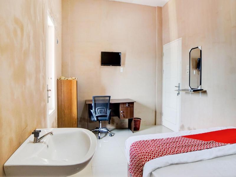 Hotel O Penginapan Syariah Faster Inn image
