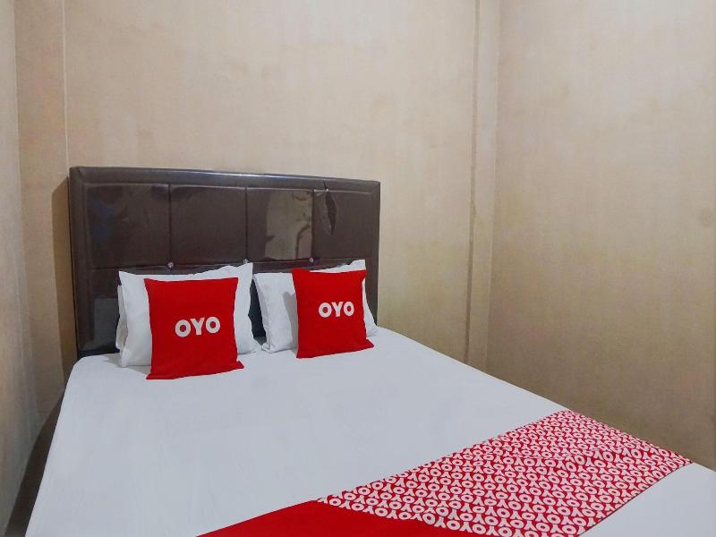Hotel O Penginapan Syariah Faster Inn image