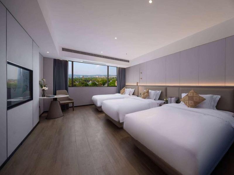 Days Hotel By Wyndham Xishuangbanna Jinghong — exterior view