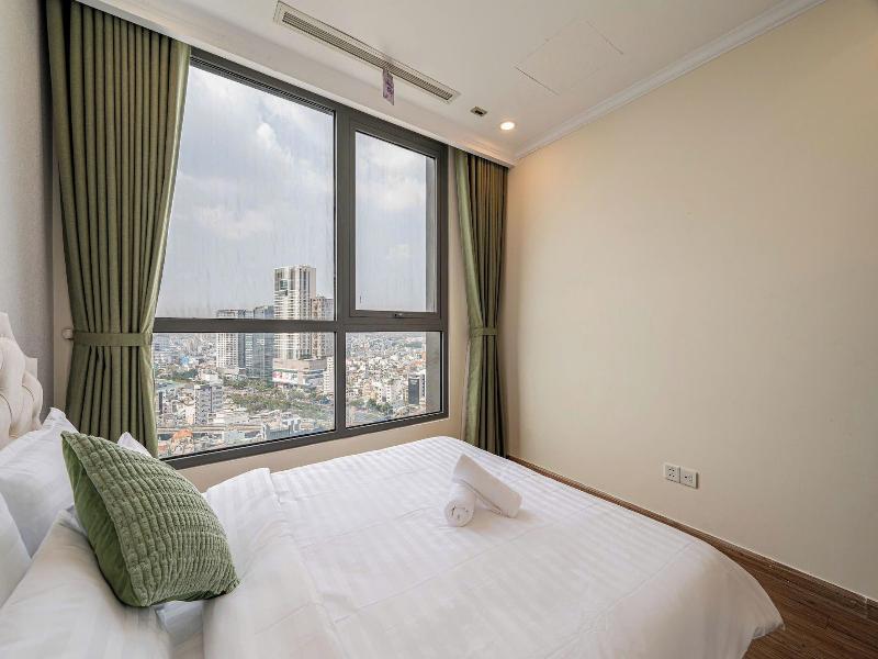 Cozy- Vinhomes Central Park Apartments image
