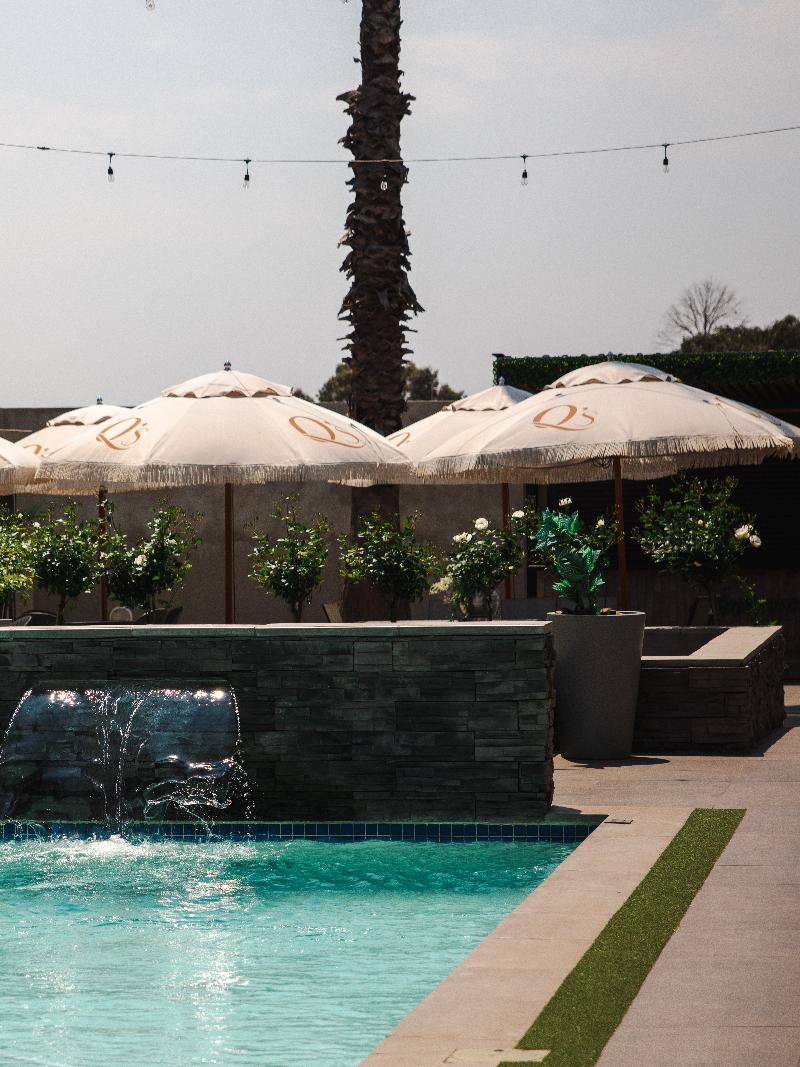Q's Evander Hotel And Apartments image