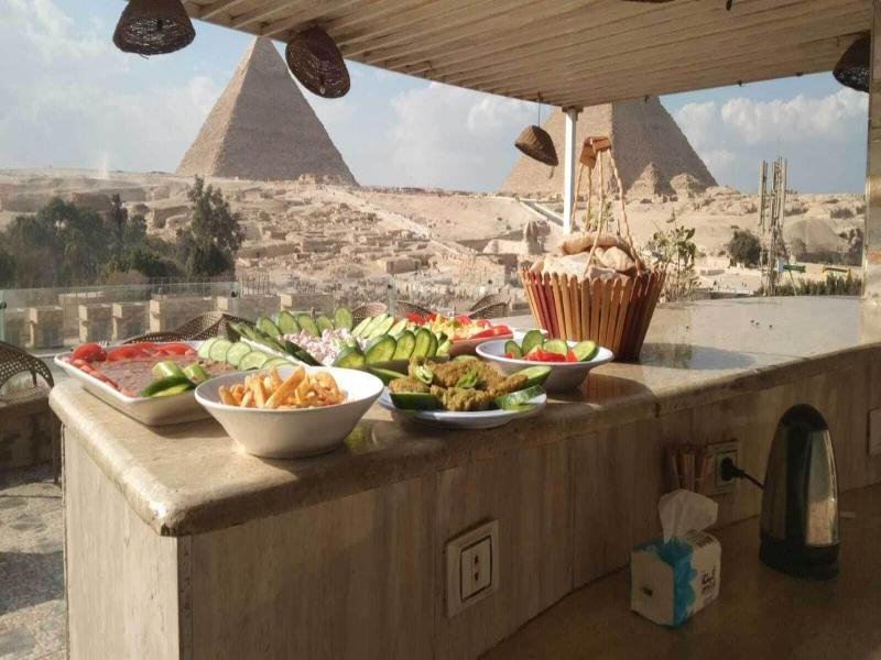 Tut & Pyramids View image