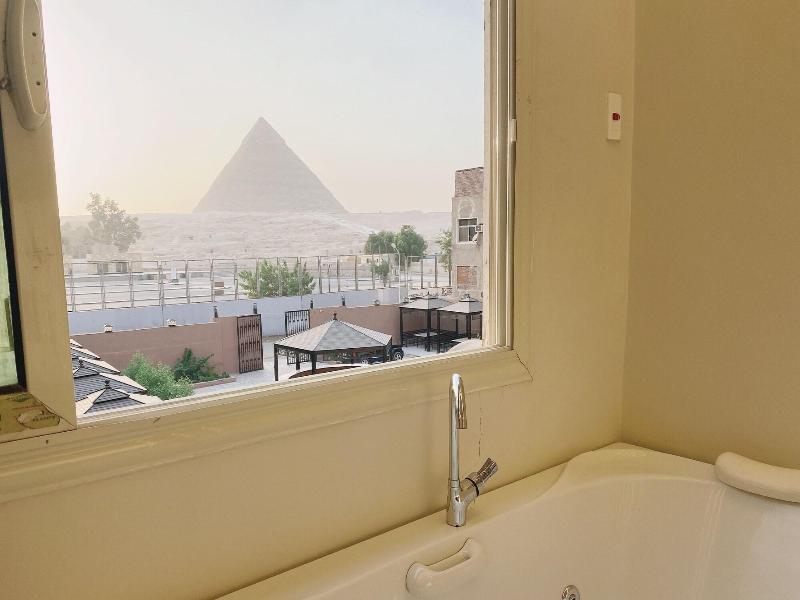 Tut & Pyramids View image