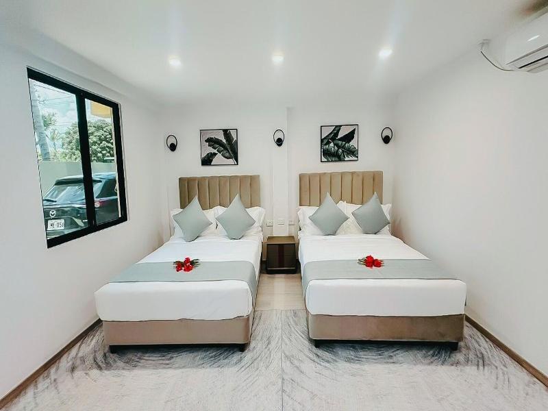 Hibiscus Suites And Residences image