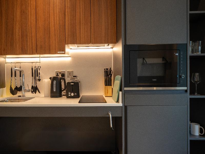 StayCozy Studio Apartments in Acton image