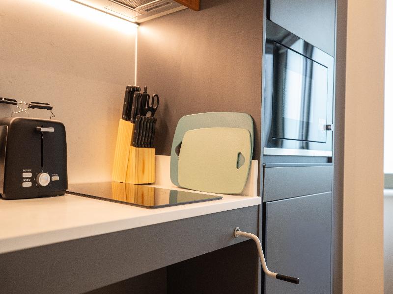StayCozy Studio Apartments in Acton image