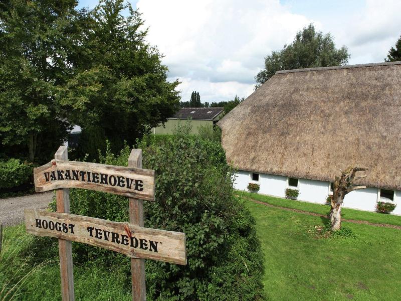 Quaint Farmhouse Near River In Oosterwijk image