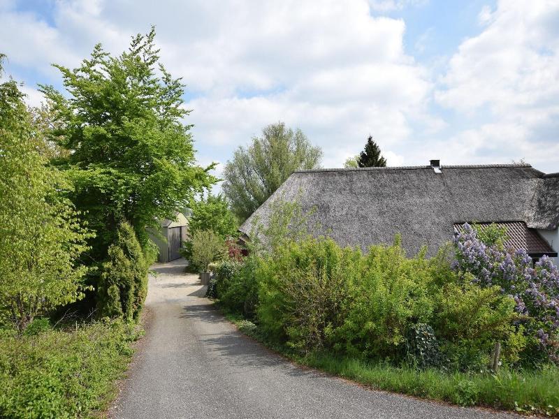 Quaint Farmhouse Near River In Oosterwijk image