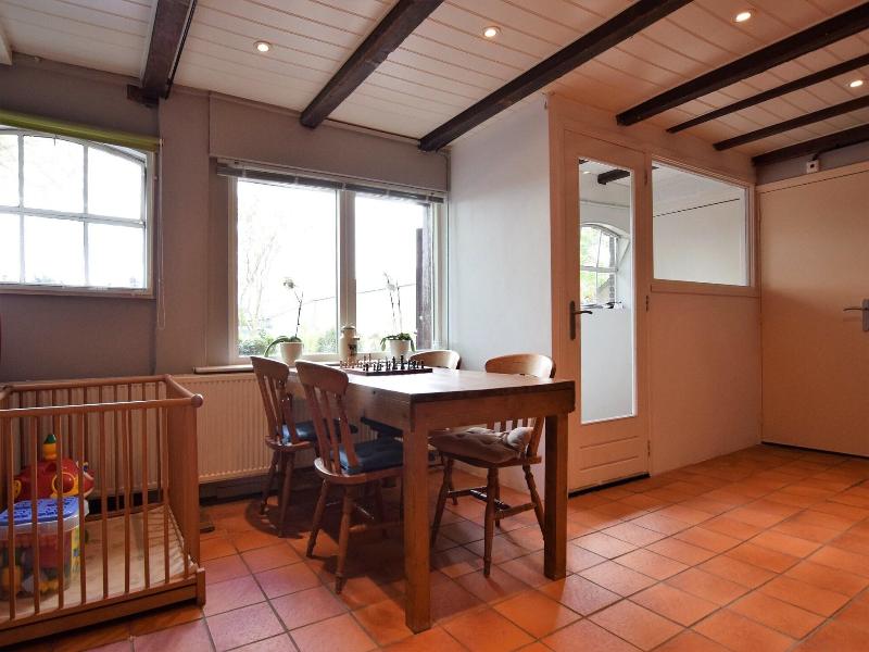 Quaint Farmhouse Near River In Oosterwijk image
