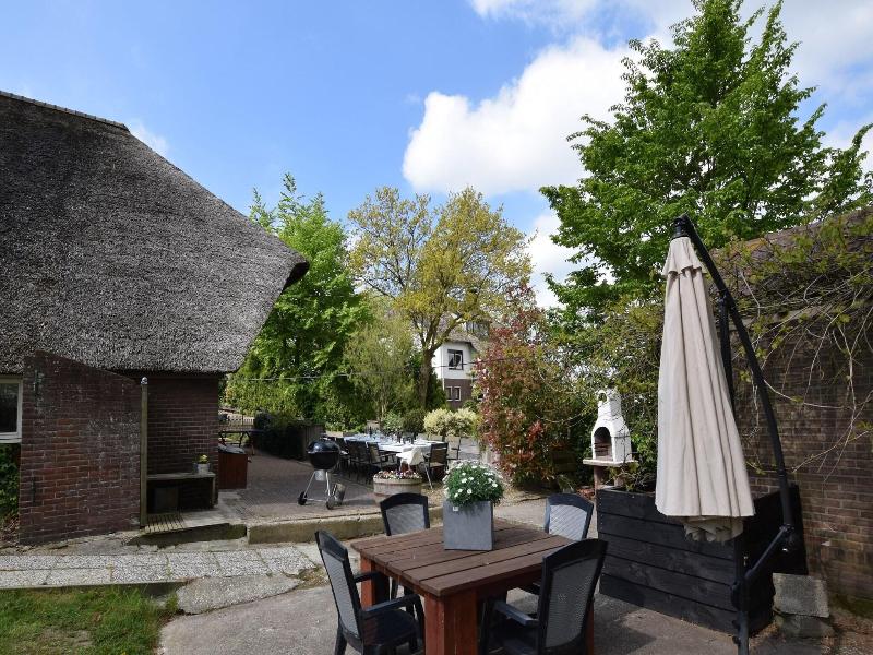 Quaint Farmhouse Near River In Oosterwijk image