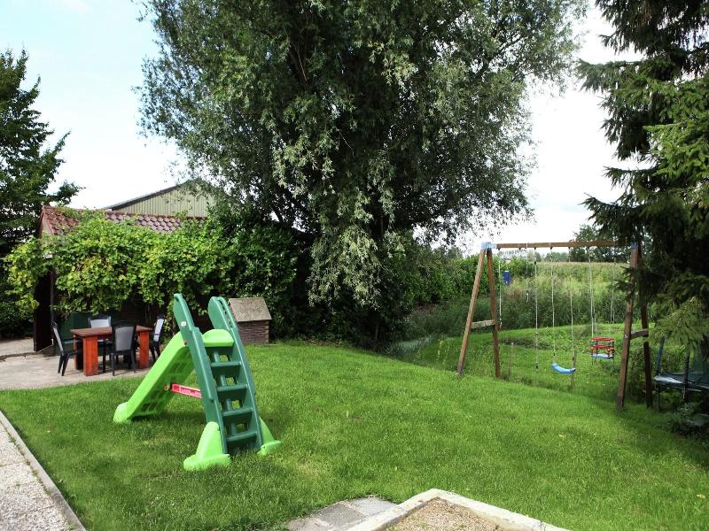 Quaint Farmhouse Near River In Oosterwijk image
