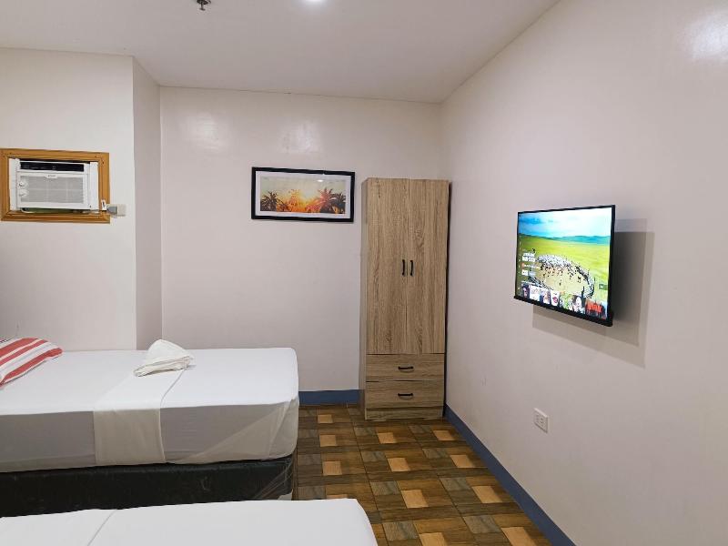 Fb Dormitel Suites image