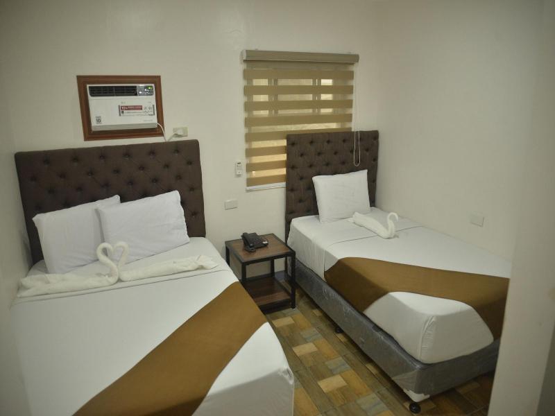 Fb Dormitel Suites image