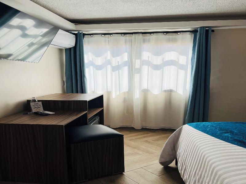 Suites Del Jardín Principal image