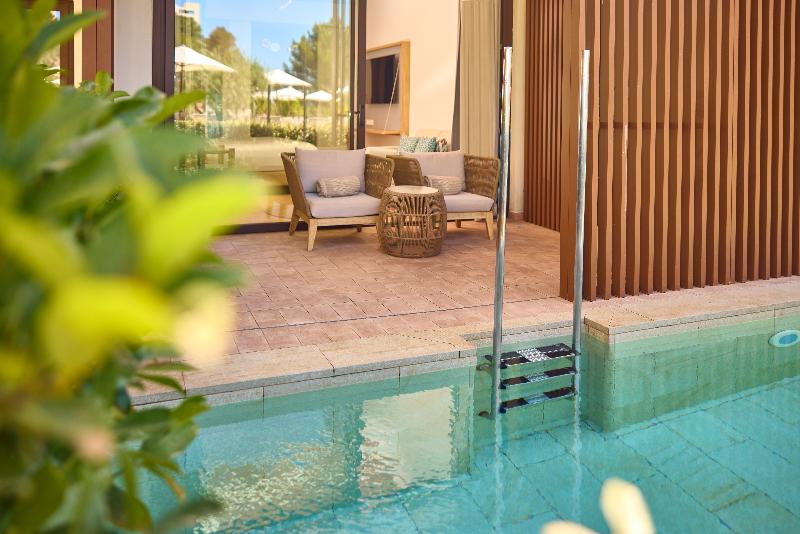Cala San Miguel Ibiza Res, Curio Colllec By Hilton image