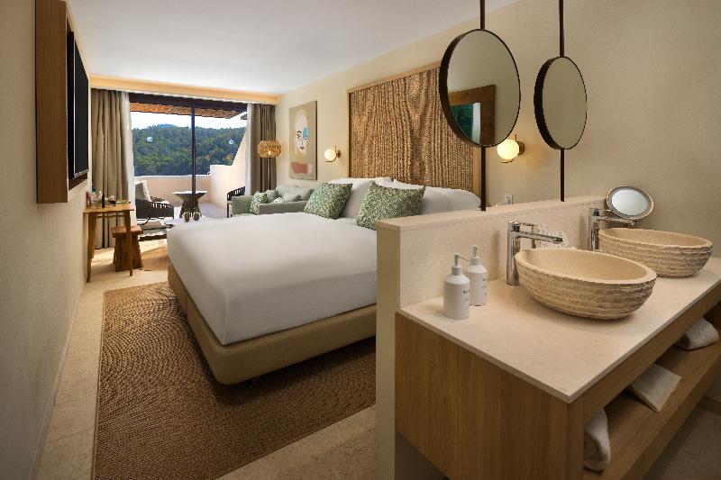 Cala San Miguel Ibiza Res, Curio Colllec By Hilton image