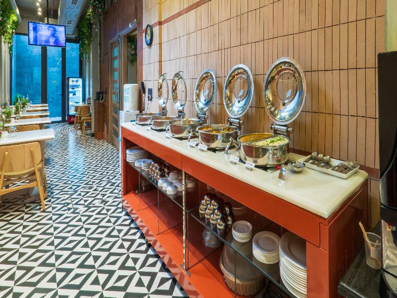 Cosy Grand @ Chanakyapuri by The Cosy Hotels image