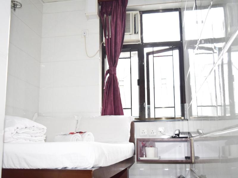 Pay-Less Guest House image