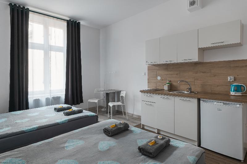 Queen Apartments image