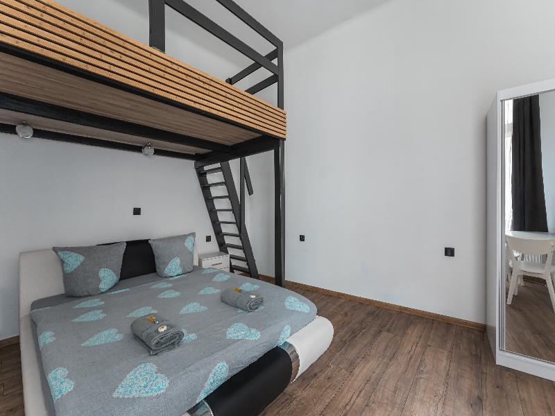 Queen Apartments image