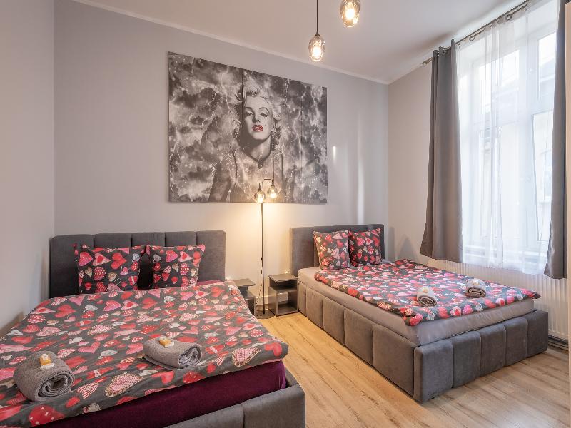 Queen Apartments image
