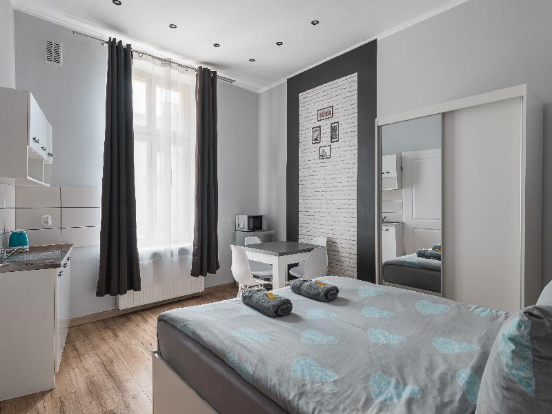 Queen Apartments image
