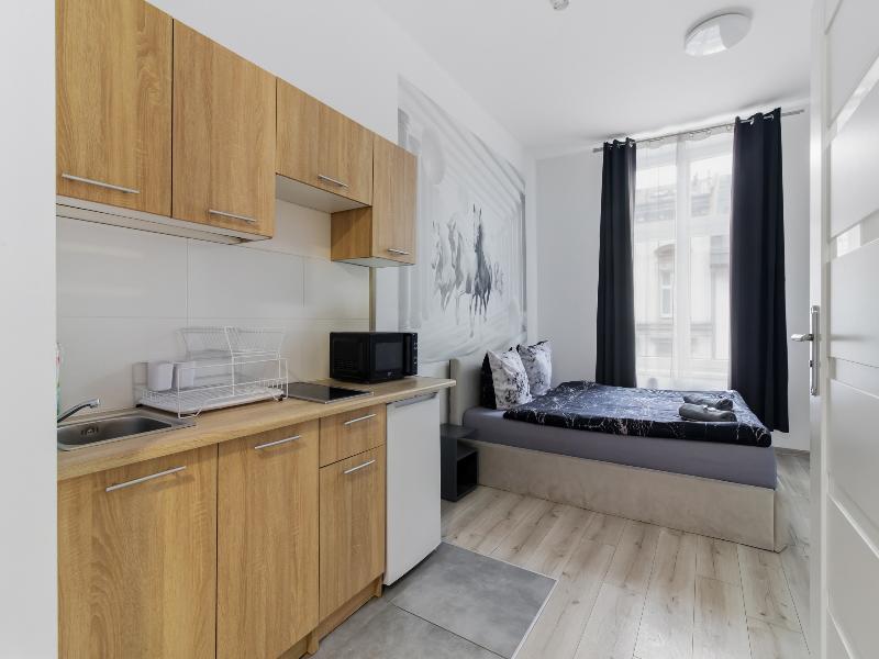 Queen Apartments image