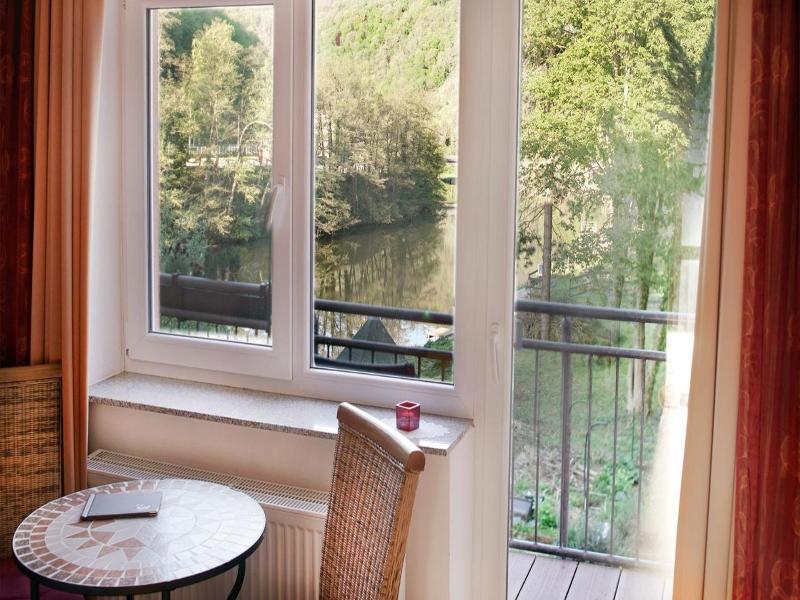 Haus am Fluss image