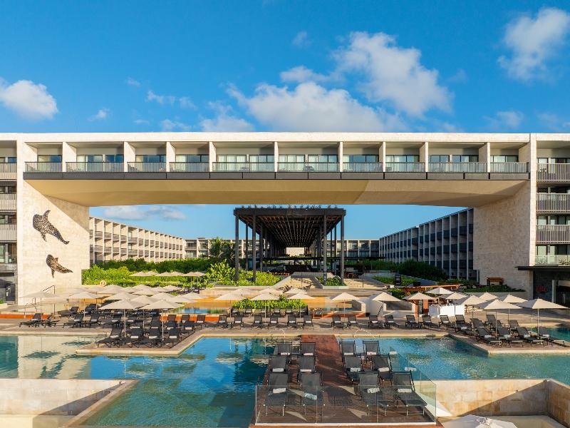 Devossion by Live Aqua Playa del Carmen AI Only Ad image