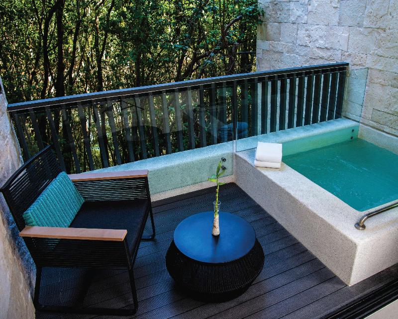 Devossion by Live Aqua Playa del Carmen AI Only Ad image