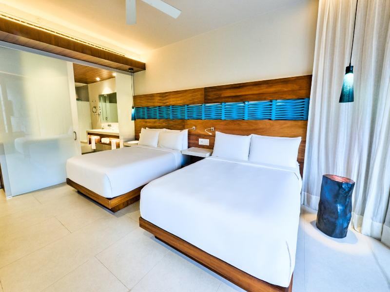 Devossion by Live Aqua Playa del Carmen AI Only Ad image