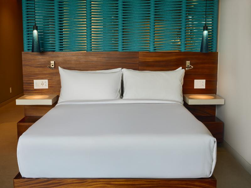 Devossion by Live Aqua Playa del Carmen AI Only Ad image