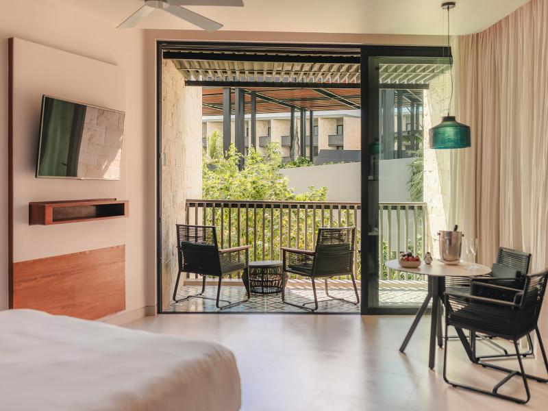 Devossion by Live Aqua Playa del Carmen AI Only Ad image
