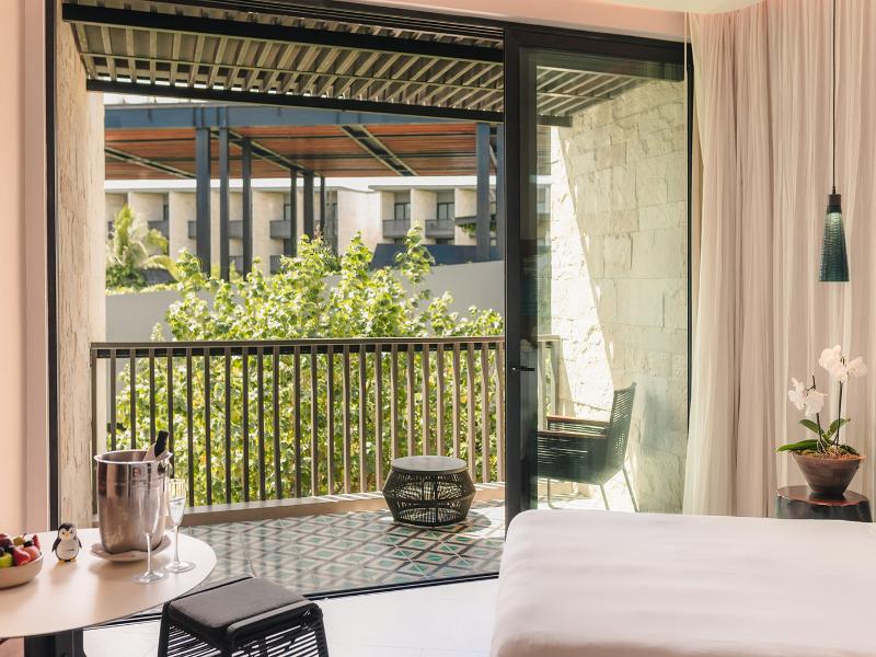 Devossion by Live Aqua Playa del Carmen AI Only Ad image