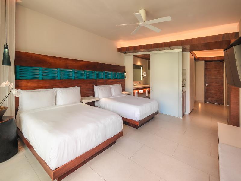 Devossion by Live Aqua Playa del Carmen AI Only Ad image