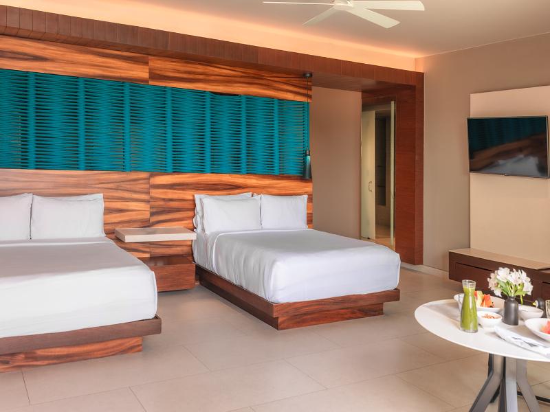 Devossion by Live Aqua Playa del Carmen AI Only Ad image