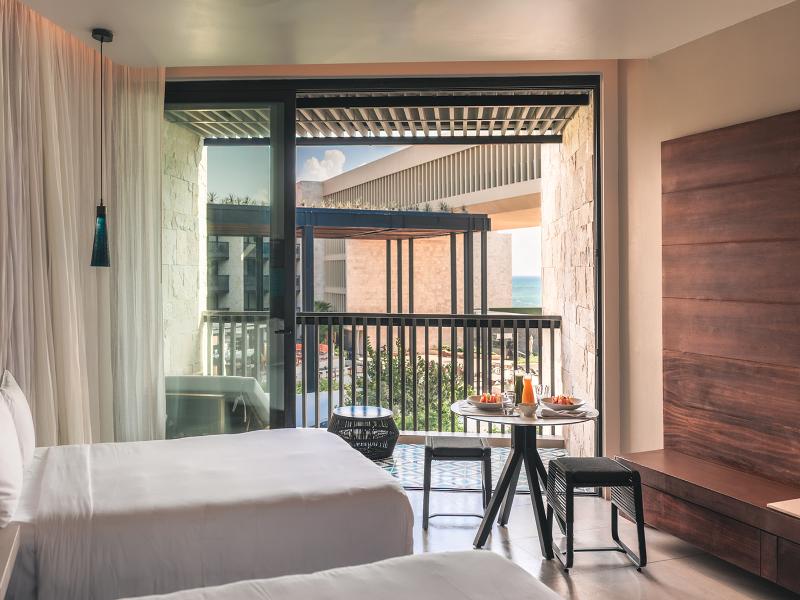 Devossion by Live Aqua Playa del Carmen AI Only Ad image