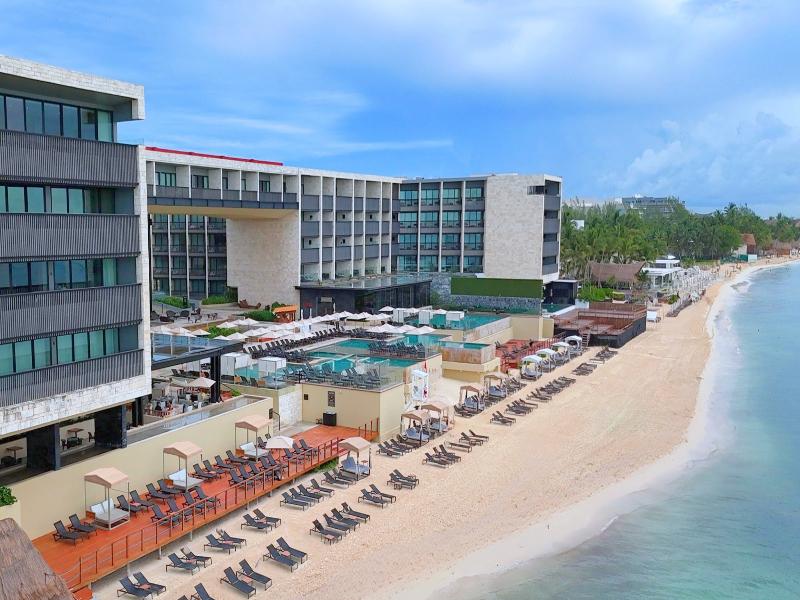 Devossion by Live Aqua Playa del Carmen AI Only Ad image