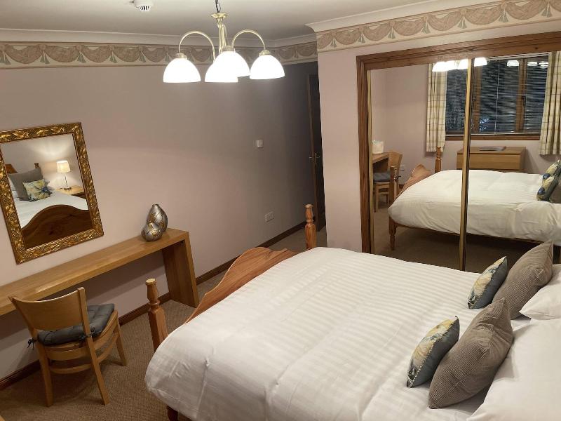 Foxglove Suites and Cottages image