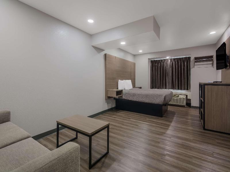AmericasBestValueInnSuites Lake Charles I210 Exit5 image