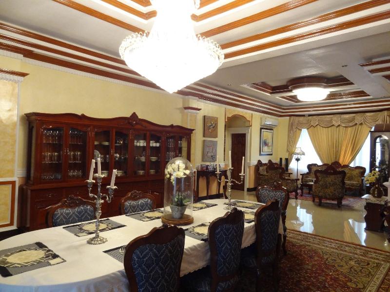 The Executive Villa Inn Suites image