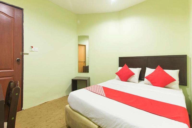 Super OYO 1102 Amani Hotel image