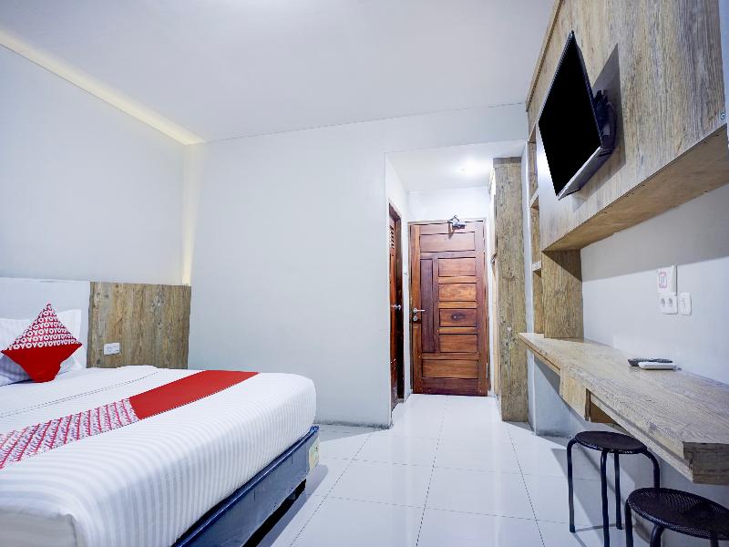 Collection O Gapura Hotel Near Parapat Penatapan D image