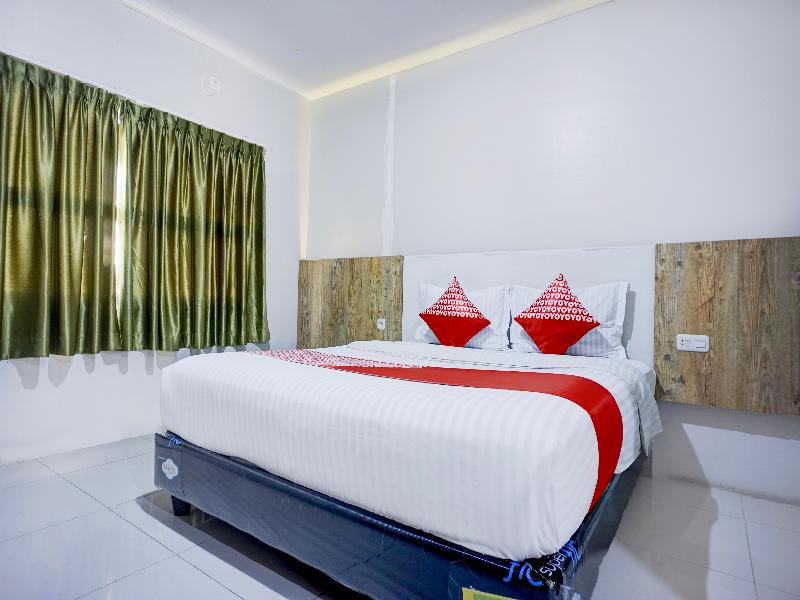 Collection O Gapura Hotel Near Parapat Penatapan D image