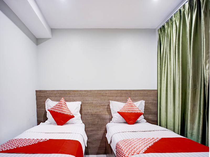 Collection O Gapura Hotel Near Parapat Penatapan D image
