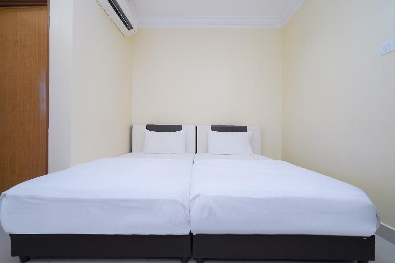 OYO 90451 Bangi Moya Guesthouse 4