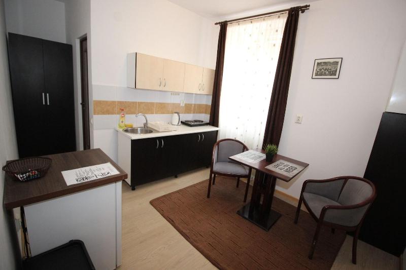 Main Square Apartments & More image