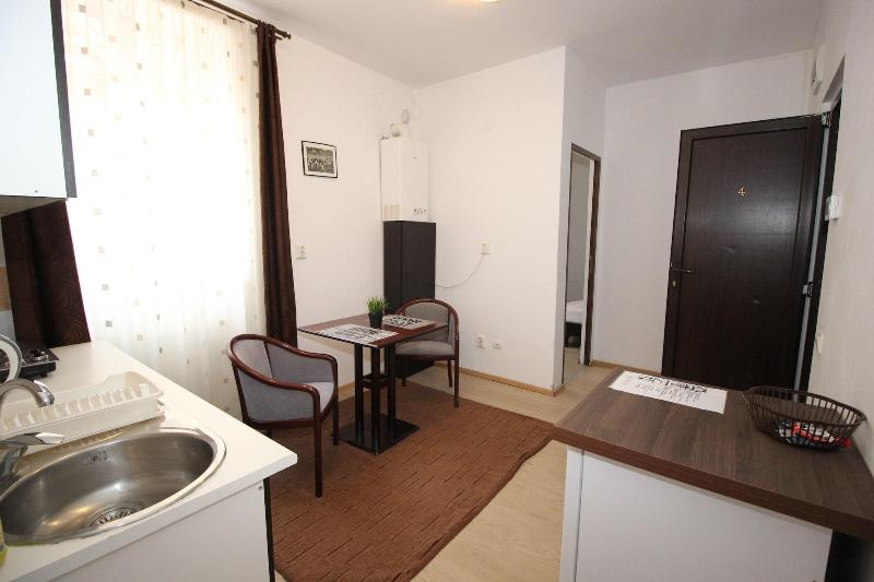Main Square Apartments & More image